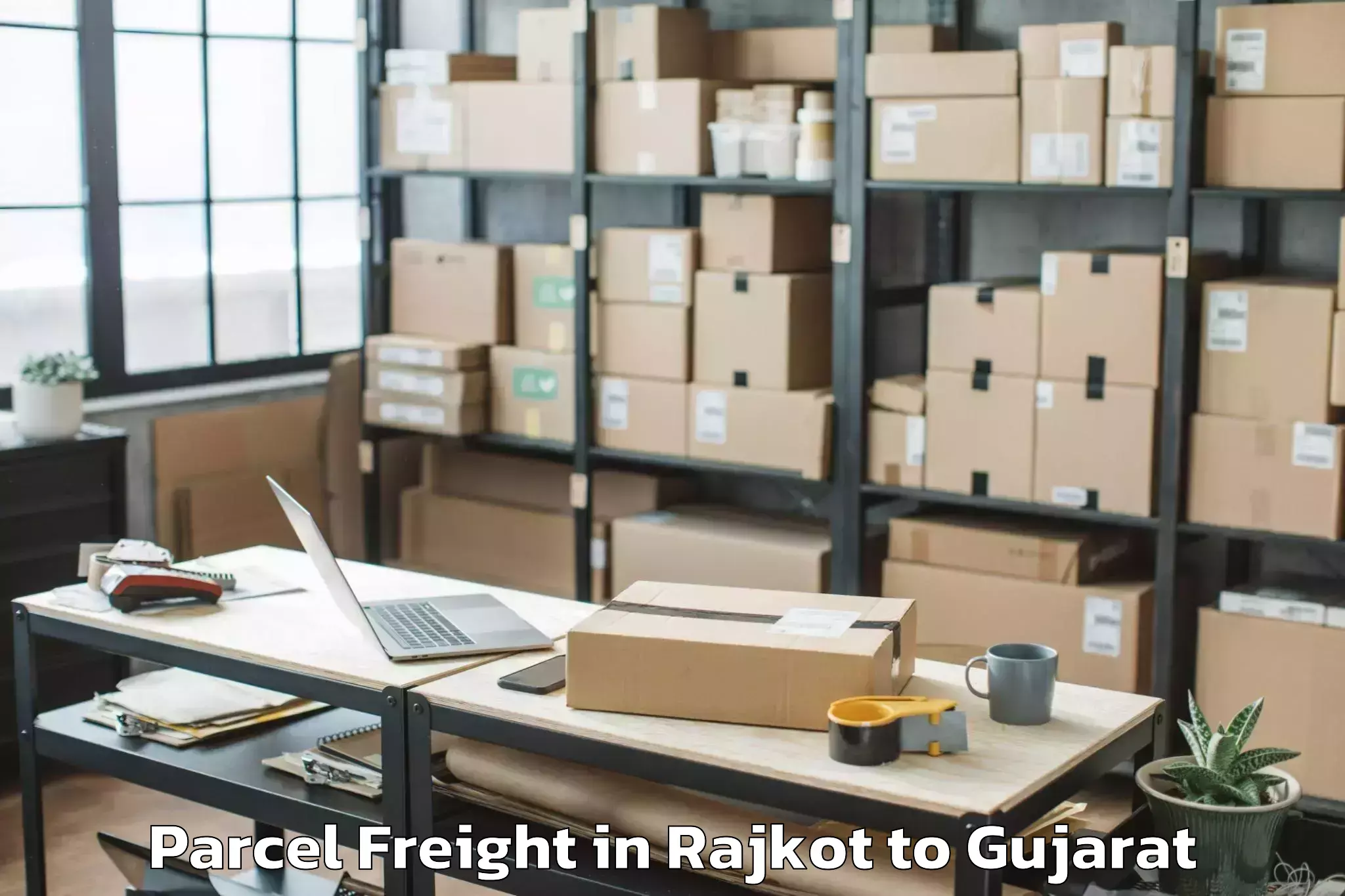 Easy Rajkot to Satlasana Parcel Freight Booking